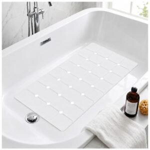 White non-slip silicone bathtub mat with suction cups for home and institutional bathroom safety.